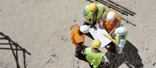 constuction-workers-in-hard-hats